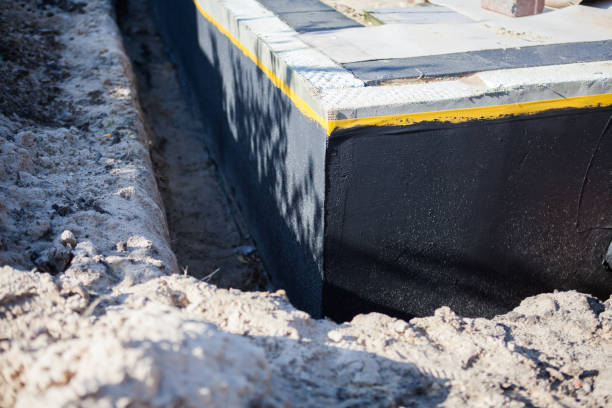 Professional Waterproofing technician working in Birnamwood, WI